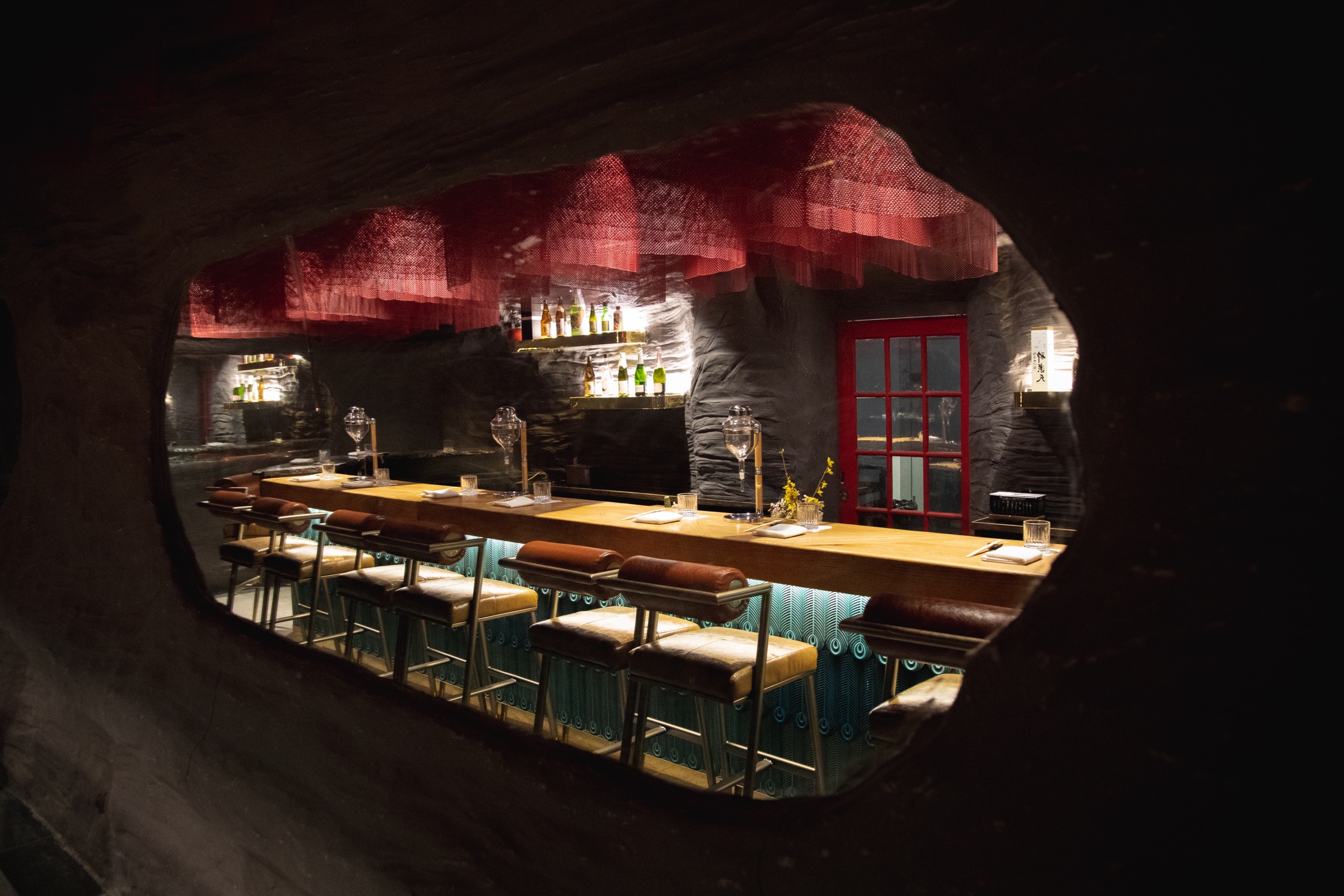 Cozy speakeasy omakase experience at Himitsu Flushing in Flushing, New York offering a unique upscale dining atmosphere.