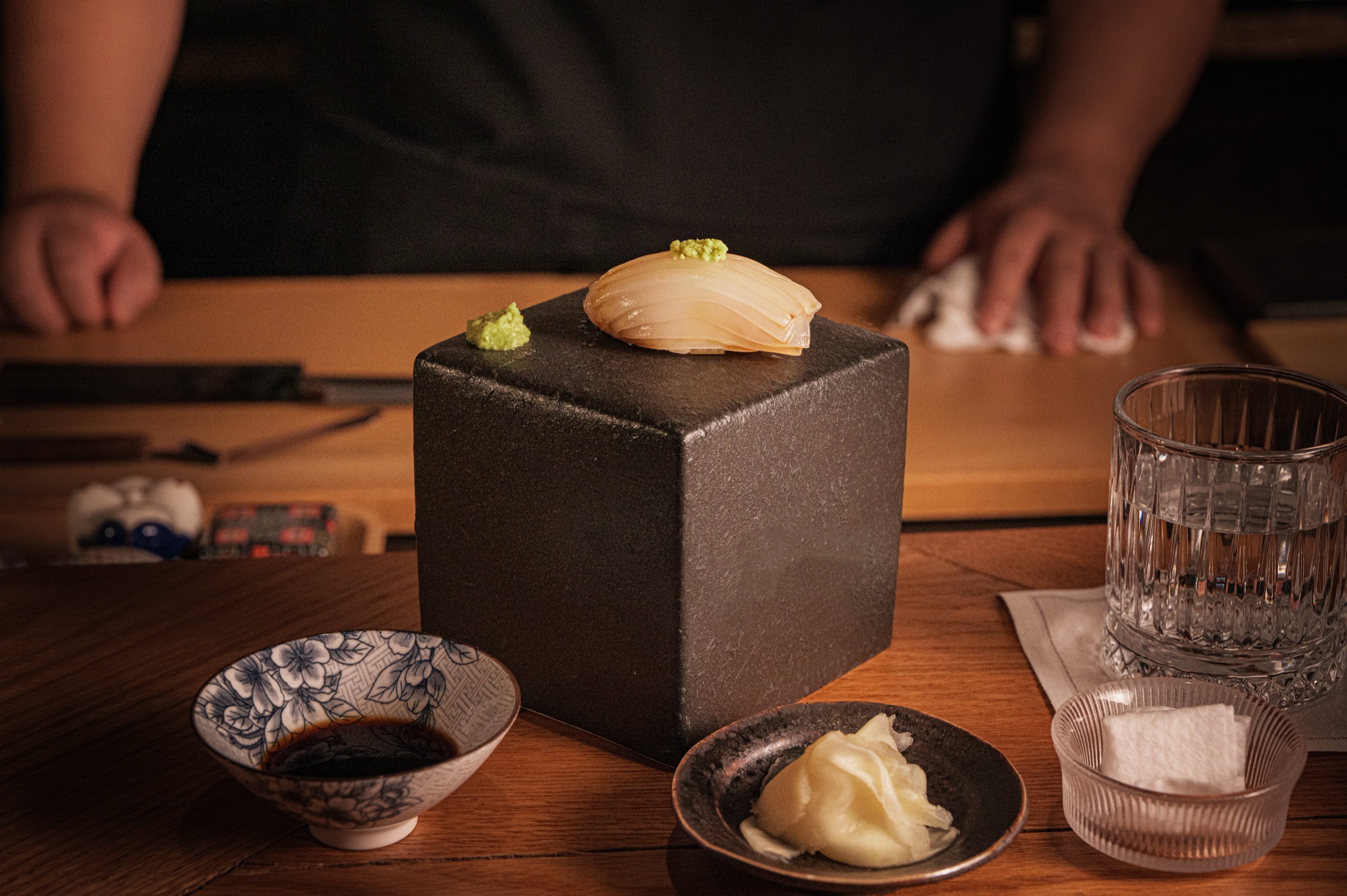 Chef-curated sushi tasting at Himitsu Flushing in Flushing, New York highlighting seasonal flavors and presentation.