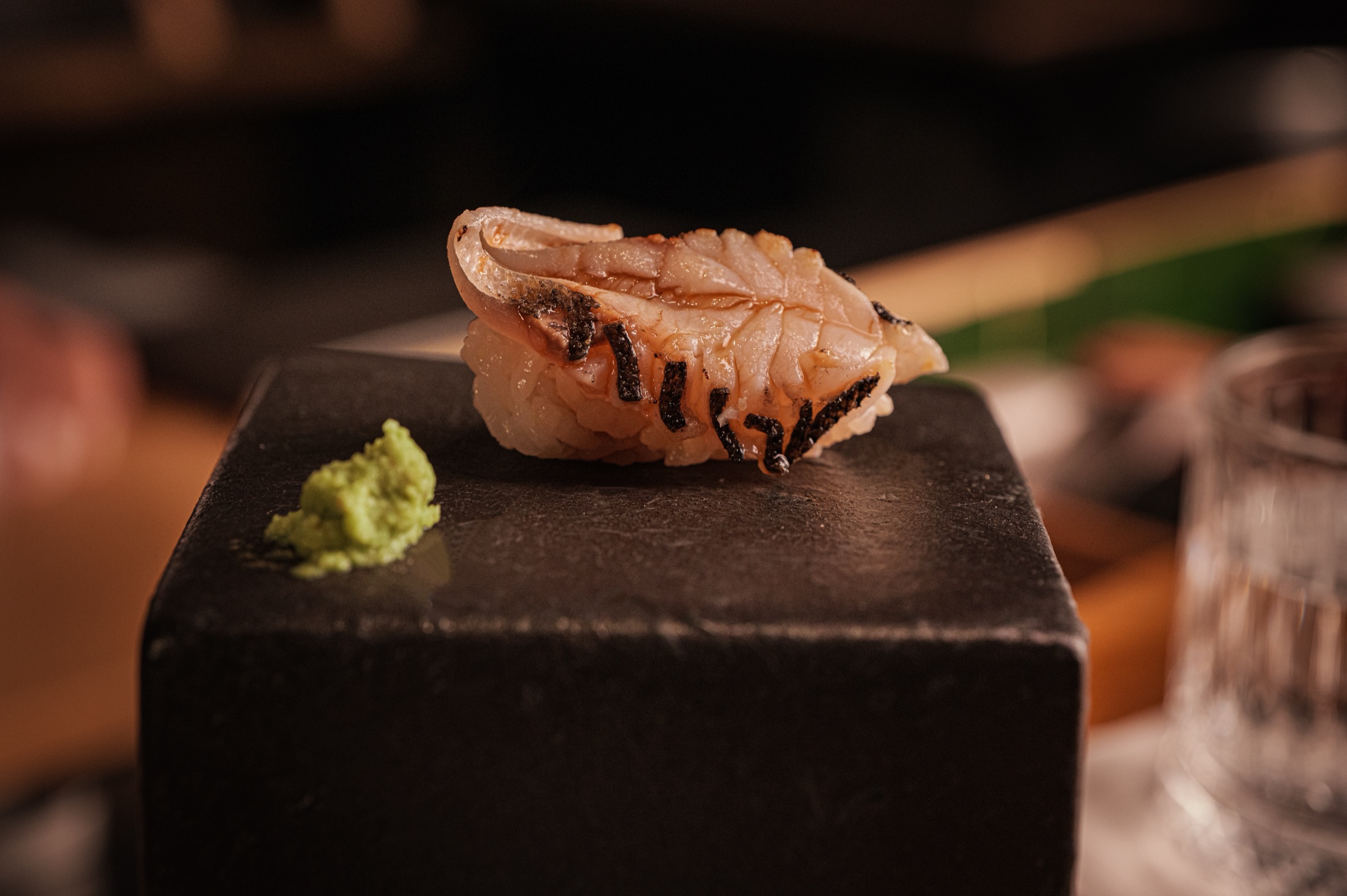 Elegant omakase sushi presentation at Himitsu Flushing in Flushing, New York featuring fresh seasonal ingredients and refined plating.