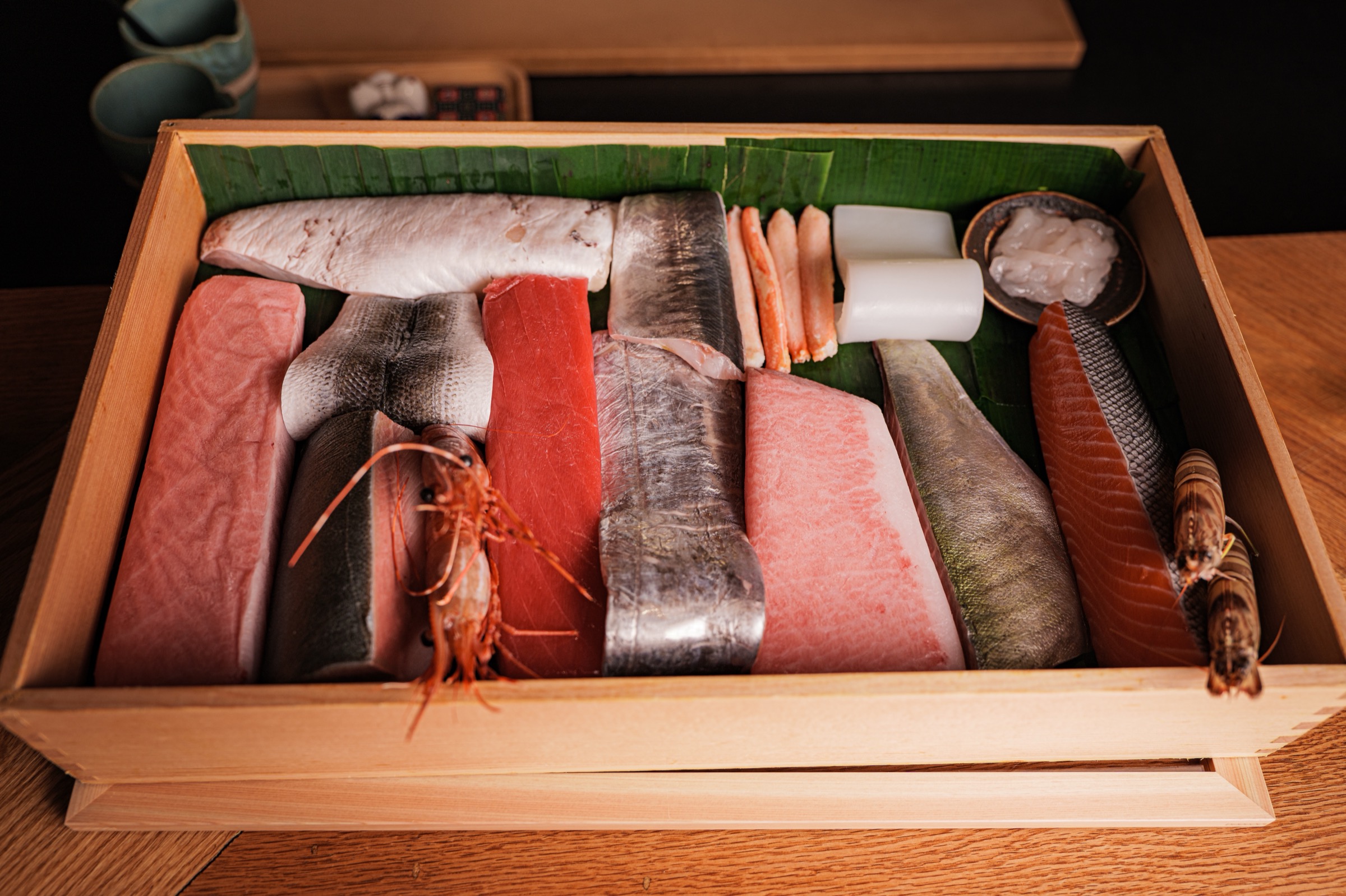 Handcrafted sushi course at Himitsu Flushing in Flushing, New York emphasizing detail and presentation.